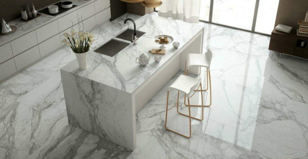 Modern kitchen in Toronto with ceramic tile flooring in neutral tones