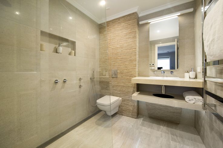 Modern bathroom renovation Toronto with glass shower and vanity