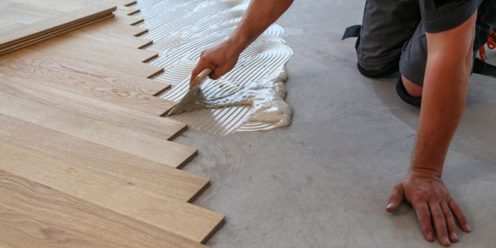 Laminate flooring installation process with professional tools