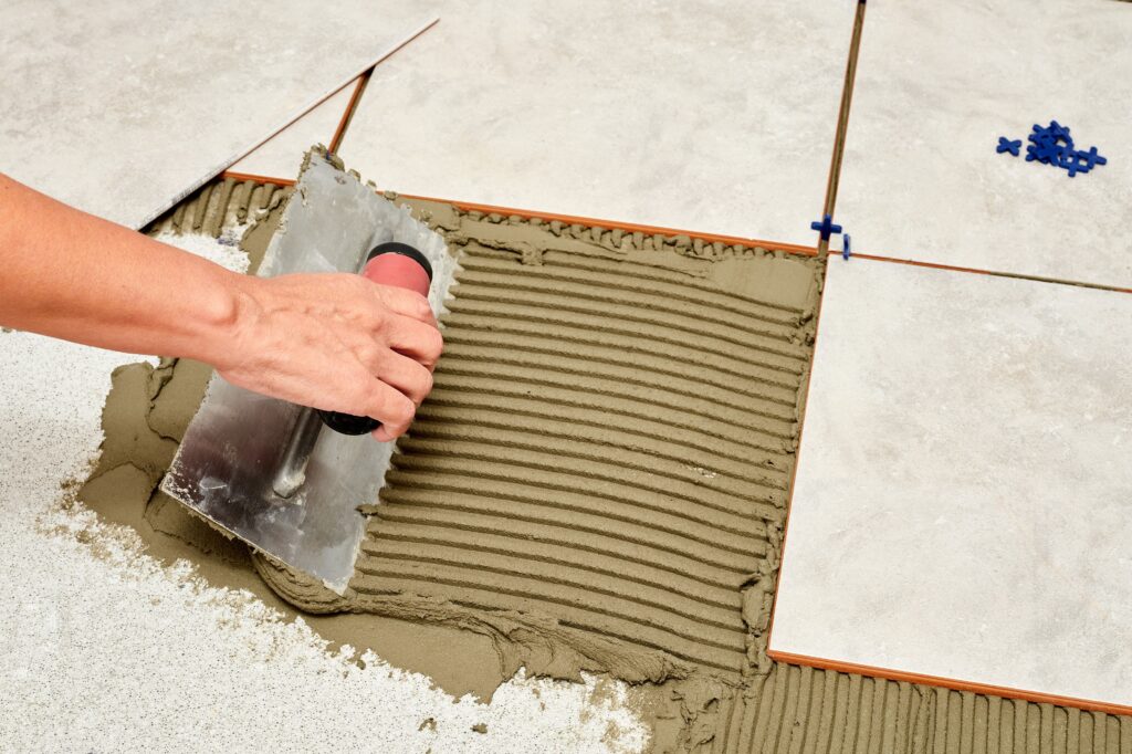 Close-up of ceramic tile flooring installation in Toronto home